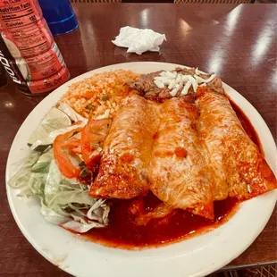 Killer chicken enchiladas w/red sauce, side salad, and rice &amp; beans!