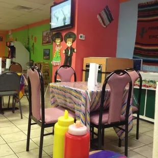 It wouldn't be a good hole in the wall without a television.