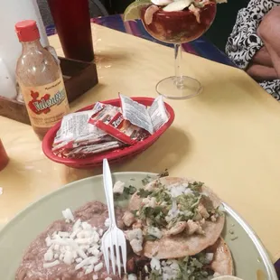 Corn tortilla chicken tacos &amp; pastor with my beans and rice.