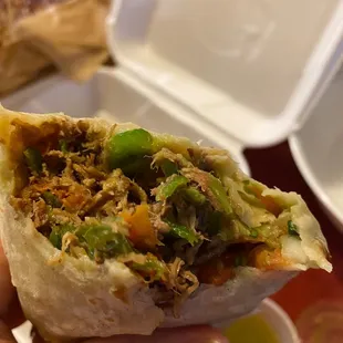 This burrito is delicious