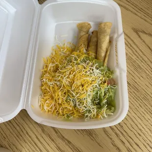 Three rolled tacos