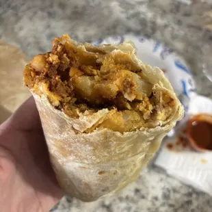 Chorizo and potato burrito with egg