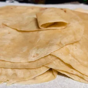 Customer gave me this tip. Unstacking the fresh tortillas like this helps keep them from sticking together later.