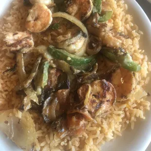 cold shrimp and veggies on new rice,  the serve was not helpful nor willing to help.  Find another place