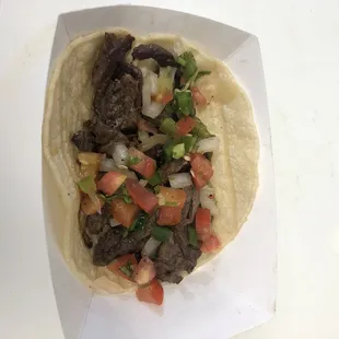 Fajita taco on corn tortilla
