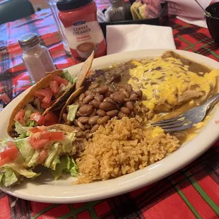 a plate of mexican food on a table