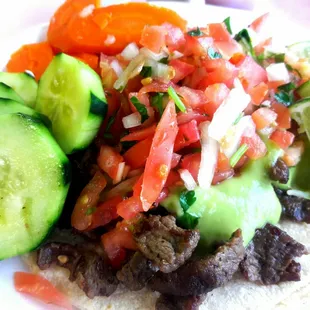 Carne asada taco, with tax 3.24 folks!