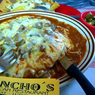 Mexican Sandwich multi layer of Tortillas Rice Beans and Chunky Beef smothered with Cheese delicious