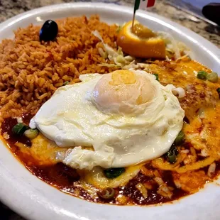 Cheese Enchilada with a sunny side up egg.