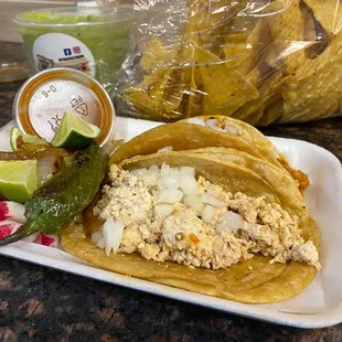2 taco plate. Chicken and al pastor, both with no cilantro.
