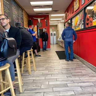 Some seats along the side but consider take out during lunch hours