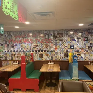 Typical booth for 4 maybe 6 on both sides and several tables throughout.
