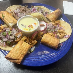 Taco Sampler - a delicious assortment of tacos. The chicken chorizo pineapple was a tasty treat.