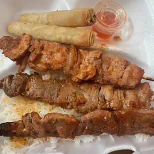 chicken skewers and rice