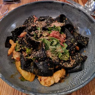 Black Papardelle, shrimp, steamed clams, bacon, heirloom tomatoes, mint, basil, arugula, breadcrumbs [28]