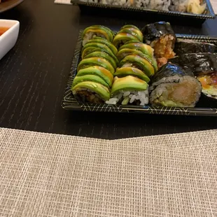 a variety of sushi and rolls
