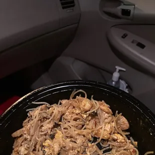 shredded chicken and noodles in a skillet