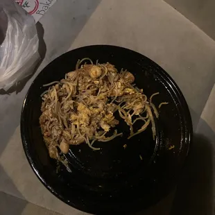 a plate of noodles on a table
