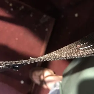 Staples were used to ghetto-rig the high chair my son was in. How on earth is this okay???