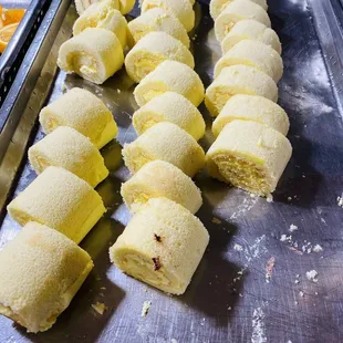 several rolls of food on a tray