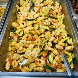 a variety of food items in a buffet