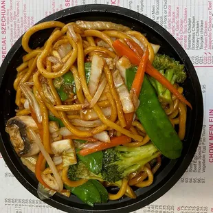 a bowl of noodles and vegetables