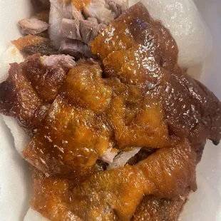 Half Peking duck on shrimp chips