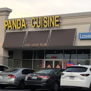 cars parked in front of the restaurant