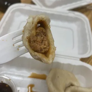 a piece of food on a fork