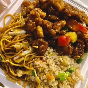 a takeout box of chinese food