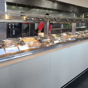 a buffet with a variety of food items
