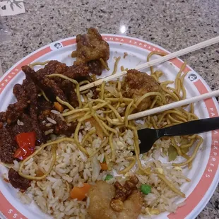 Bejing beef and whats left of the orange chicken, noodles and fried rice.