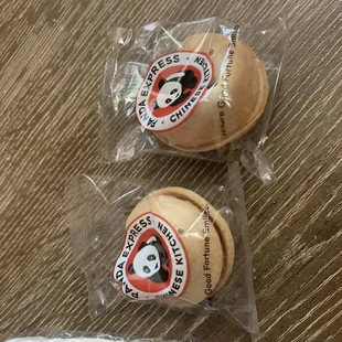 two cookies wrapped in plastic wrap