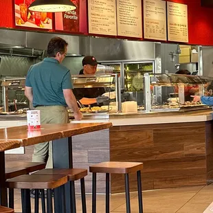 a man and a woman in a restaurant