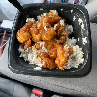 Orange chicken with a lot of yummy food. Absolutely love it and never getting anything different.