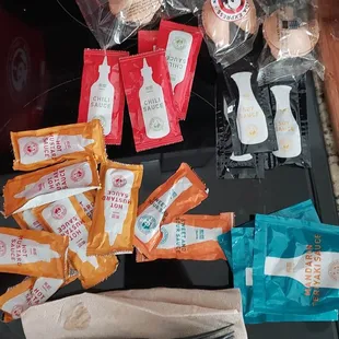 Sauces, Utensils, Napkins, Fortune Cookies.