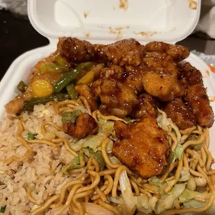 Plate with Half Chow Mein, Half Fried Rice, Orange Chicken, and Honey Sesame Chicken Breast