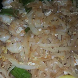 a pan of noodles and vegetables