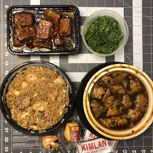 From left to right, top to bottom: Crispy Tofu with Sesame Sauce, Seaweed Salad, Panda Fried Rice, and Szechuan Spicy Dumpling.