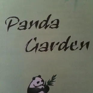 a panda eating bamboo leaves