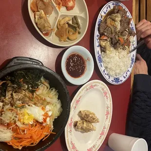a table with a variety of asian food
