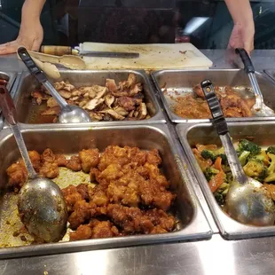 a buffet with a variety of food items