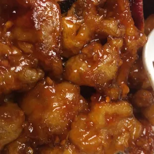 Orange Chicken. Tasty. Better than average, retains some crispness &amp; is not soggy.