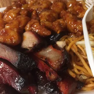 A generous combo w/Orange Chicken, BBQ Pork &amp; Chow Mein. $7. Feeds 2-3 easy!