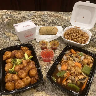 General Tso&apos;s Chicken, spicy Szechuan Spicy Chicken with lo mein noodles and a BIG spring roll.