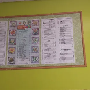 Large menu on wall.