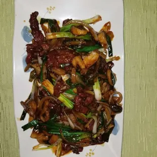 a plate of stir fried vegetables