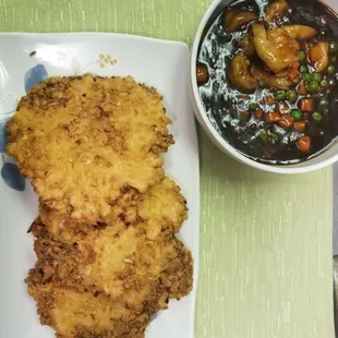 a plate of food and a bowl of soup