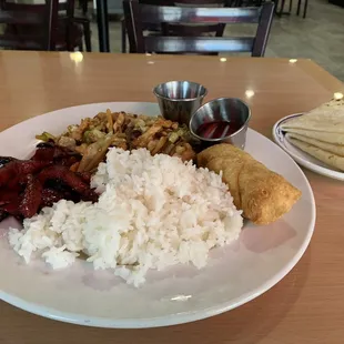 Moo shu chicken with a side of rice, egg roll and boneless ribs.  Very yummy.