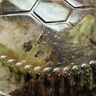 broccoli and rice in a foil pan